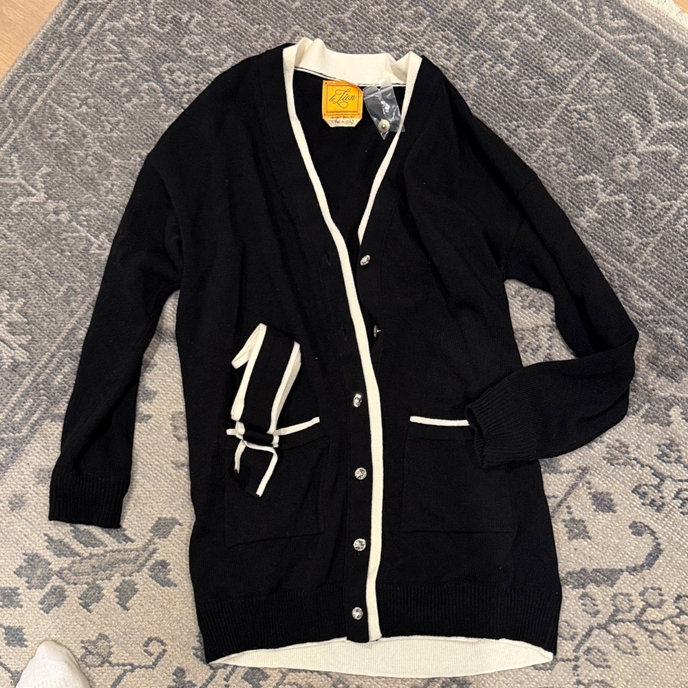 Le Lion Cashmere Black Cardigan with White Trim and Rhinestone Button